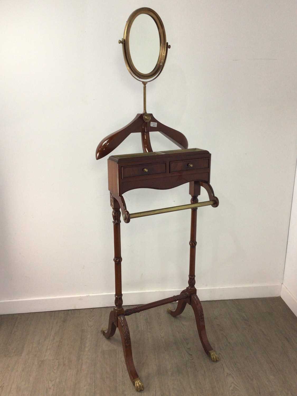 A MAHOGANY VALET STAND AND FLOOR LAMP