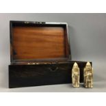 A RESIN LEWIS CHESS SET IN A COROMANDEL BOX