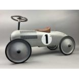 A RIDE-ON MODEL RACING CAR OF VINTAGE DESIGN