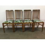 A GROUP OF SEVEN OAK DINING CHAIRS