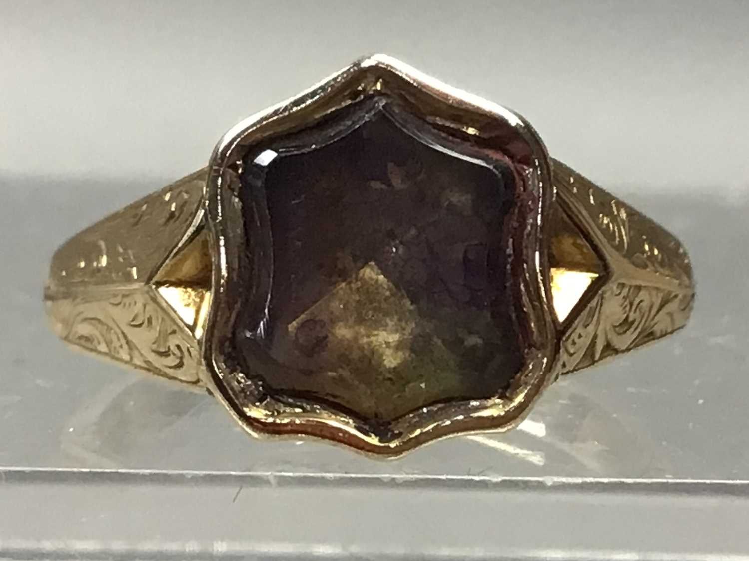 A GEM SET SIGNET RING