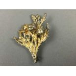 A SILVER GILT FLORA DANICA BROOCH AND PAIR OF CLIP EARRINGS