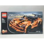 A LEGO TECHNIC 42093 SET AND THREE LEGO CITY SETS