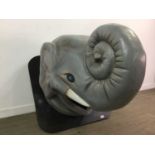 A LARGE FIBREGLASS ELEPHANT'S HEAD