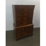 A REPRODUCTION WALNUT CHEST ON CHEST