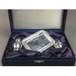 A ROBERT CARSS SILVER CRUET SET