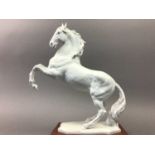 A KAISER BISQUE PORCELAIN HORSE SCULPTURE