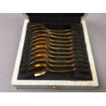 A SET OF ELEVEN CHRISTOFLE GOLD PLATED COFFEE SPOONS AND OTHER CUTLERY