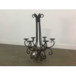 A WROUGHT METAL SIX LIGHT PICKET CHANDELIER