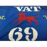 A LARGE ADVERTISING FLAG FOR VAT 69 WHISKY WITH EMBROIDERED DOG LOGO