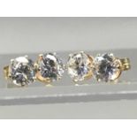 A PAIR OF CUBIC ZIRCONIA EARRINGS