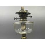 A BRASS OIL LAMP