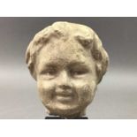CLASSICAL STYLE BUST OF A BOY A CLASSICAL STYLE BRONZE AND A POTTERY FIGURE