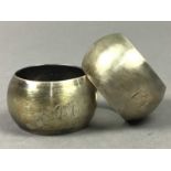 PAIR OF EDWARDIAN SILVER NAPKIN RINGS AND A BANGLE