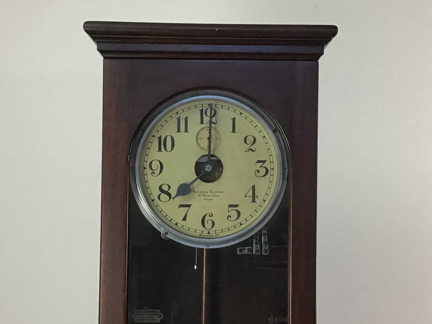 NATIONAL ELECTRIC OAK CASED CLOCK