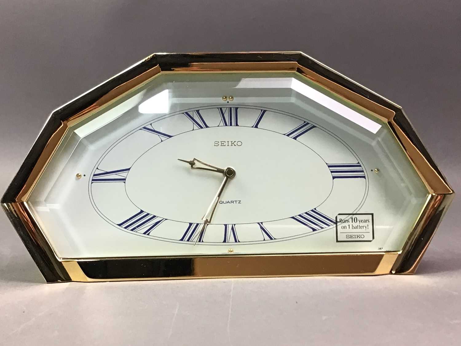 SEIKO MANTEL CLOCK WITH A BRASS TOASTING FORK AND VINTAGE GARDEN SPRAYER