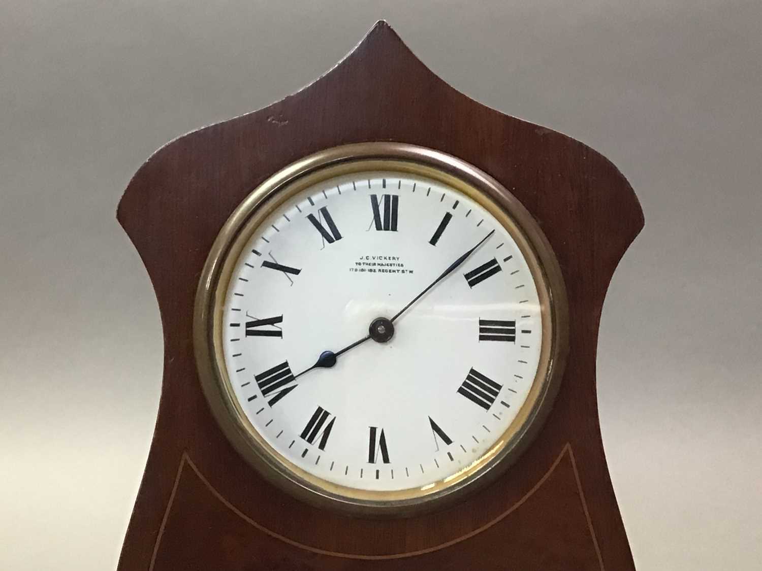 EDWARDIAN WALNUT MANTEL CLOCK AND A PLATED DRESSING TABLE SET