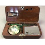 SET OF VINTAGE COIN SCALES