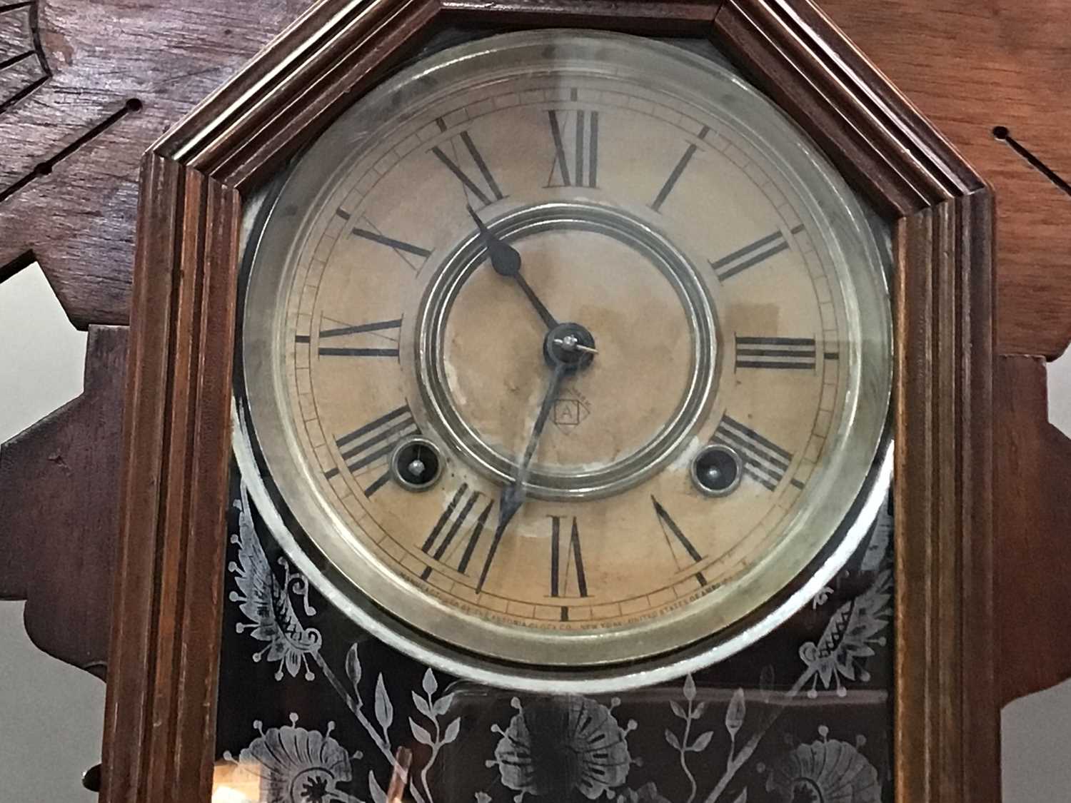 AMERICAN 'GINGERBREAD' SHELF CLOCK AND A CARRIAGE CLOCK