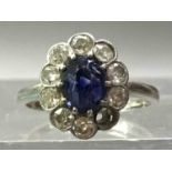 EDWARDIAN SAPPHIRE AND DIAMOND CLUSTER RING ALONG WITH A PAIR OF TIFFANY EARRINGS