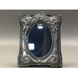 ART NOUVEAU STYLE SILVER PHOTOGRAPH FRAME ALONG WITH A COLLECTION OF JEWELLERY