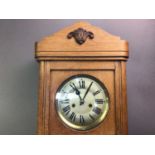 OAK WALL CLOCK ALONG WITH AN ANEROID BAROMETER