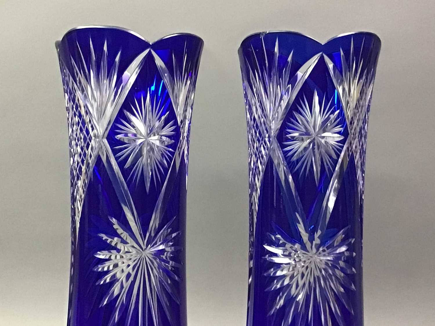 PAIR OF BOHEMIAN GLASS VASES AND ANOTHER