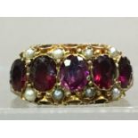 NINE CARAT GOLD RHODOLITE GARNET AND PEARL RING 19TH CENTURY