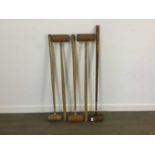 GROUP OF FIVE VINTAGE WOODEN CROQUET STICKS