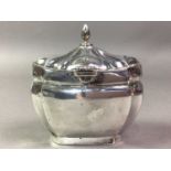 SILVER TEA CADDY ALONG WITH A CIGARETTE BOX AND PEPPER POT