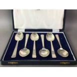 SET OF SIX ELIZABETH II SILVER TEASPOONS AND A SILVER WINE SLIDE