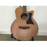 TANGLEWOOD ELECTRO ACOUSTIC GUITAR ALONG WITH AN AMP