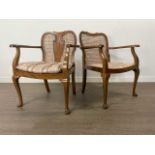 MATCHED PAIR OF WALNUT ELBOW CHAIRS