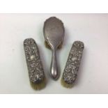 PAIR OF SILVER BRUSHES, ANOTHER SILVER BRUSH AND A SALVER