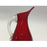 PAIR OF SMALL RED GLASS JUGS ALONG WITH OTHER GLASS WARE
