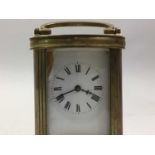 FRENCH BRASS AND COPPER CARRIAGE CLOCK