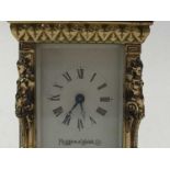 MAPPIN AND WEBB BRASS CARRIAGE CLOCK ALONG WITH AN OAK MANTEL CLOCK
