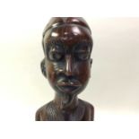 PAIR OF AFRICAN CARVED WOOD BUSTS