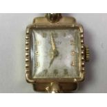 NINE CARAT GOLD WRIST WATCH