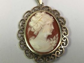 GOLD CAMEO PENDANT ON CHAIN, ALONG WITH AN OVAL CAMEO BROOCH