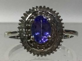 EIGHT TANZANITE RINGS