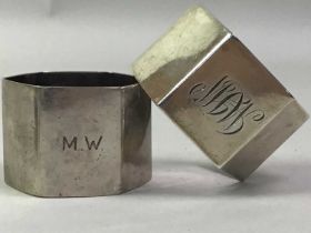 FOUR SILVER NAPKIN RINGS, ALONG WITH A SILVER BOOKMARK
