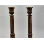 PAIR OF LOCAL INTEREST OAK CANDLESTICKS, CIRCA EARLY 20TH CENTURY