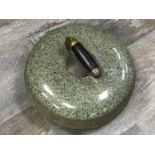 TWO CURLING STONES,