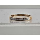 NINE CARAT GOLD DIAMOND ETERNITY RING,