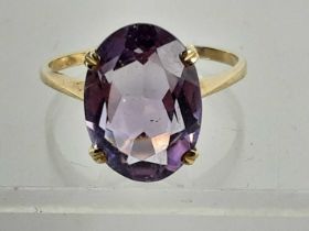 NINE CARAT GOLD AMETHYST RING,