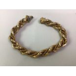 NINE CARAT YELLOW GOLD FANCY LINK BRACELET, AND A YELLOW METAL PENDANT ON CHAIN