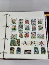 TEN ALBUMS OF SPORTING STAMPS,