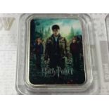 THREE HARRY POTTER COLOURISED COIN COLLECTIONS,