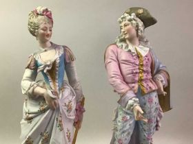 PAIR OF CERAMIC FIGURES OF A MAN AND LADY,